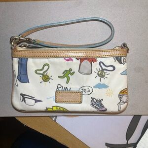 Dooney & Bourke Disney Sketch Marathon Wristlet 70.3 Run is a small wristlet